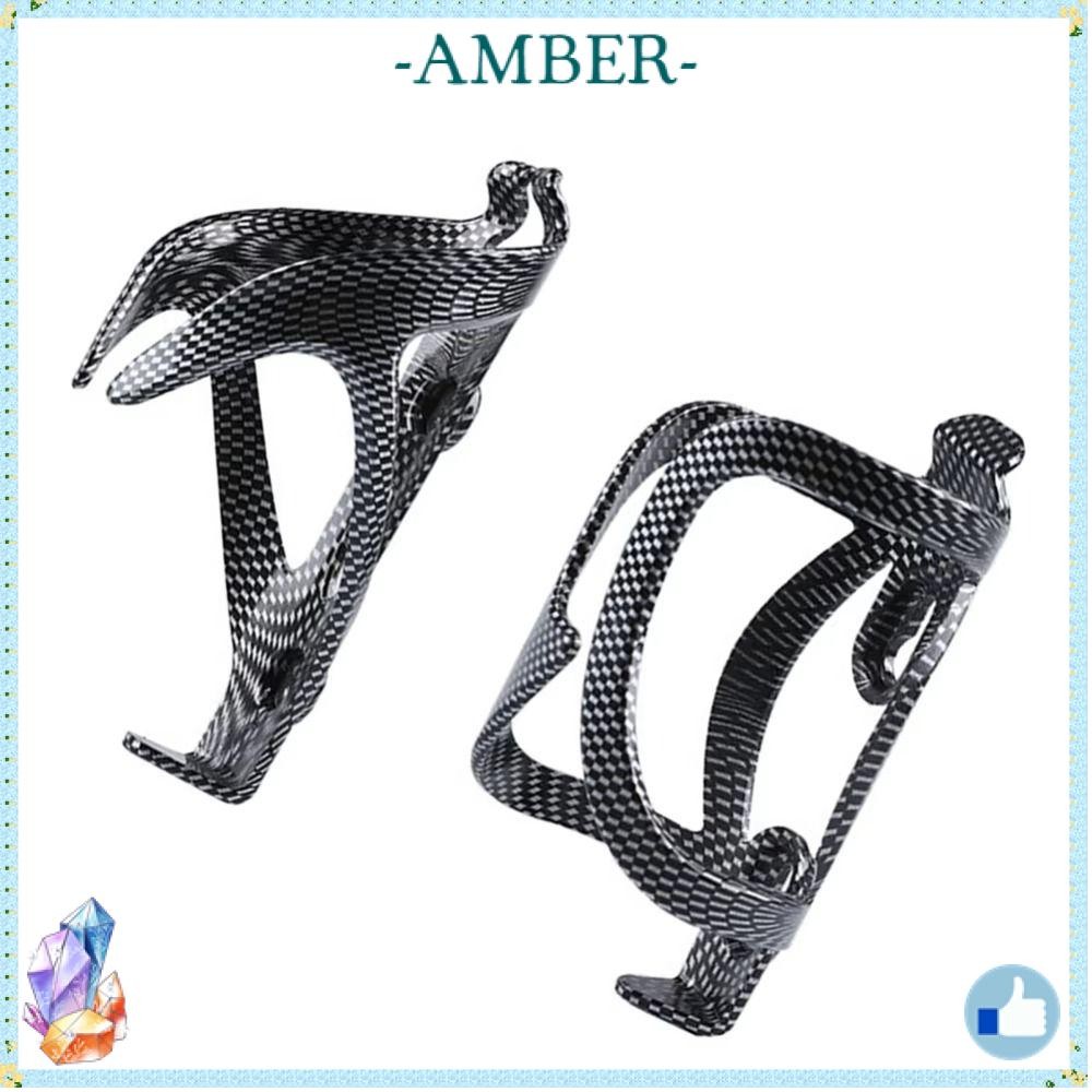กรงขวดน้ำและที่วางแก้วน้ำABSสำหรับจักรยานMTB และAMBER อุปกรณ์เสริมจักรยานน้ำหนักเบาทะแคงใช้งานได้หลากหลาย