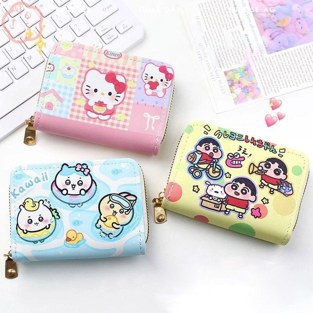 กระเป๋าเงิน Hello Kitty ดีไซน์น่ารัก มีช่องสำหรับเก็บเหรียญและบัตร พร้อมช่องพิเศษสำหรับของเล่นแบบการ์ตูน