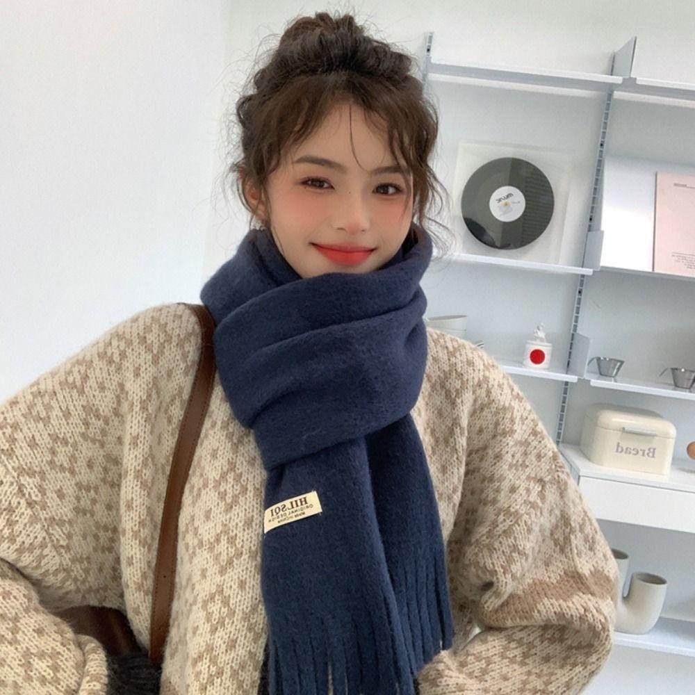 ผ้าพันคอแคชเมียร์สีทึบ ดีไซน์พู่ยาว สวมใส่สบายในฤดูหนาว - รูปที่ 4