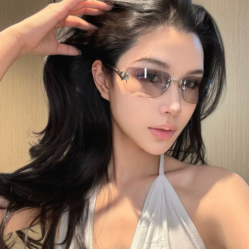 แว่นกันแดดทรงแคทอายแบบไร้กรอบรูปดาวสไตล์ยุโรปและอเมริกาใหม่แว่นกันแดดระดับไฮเอนด์สําหรับผู้หญิง