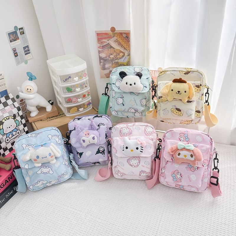 Sanrio กระเป๋าเด็กอินเทรนด์ Kuromi ใหม่พิมพ์เด็ก Melody กระเป๋าเป้สะพายหลังขนาดเล็ก Cinnamoroll การ์ตูนเด็ก Hello Kitty กระเป๋าใส่เหรียญ Pochacco สะพาย Pom Purin แฟชั่น