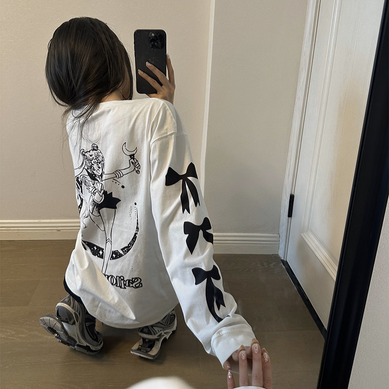 ซูซี พิมพ์ย้อนยุคลําลองแฟชั่นที่เรียบง่ายหลวมคอกลมแขนยาวเสื้อยืดผู้หญิงด้านบน 240829