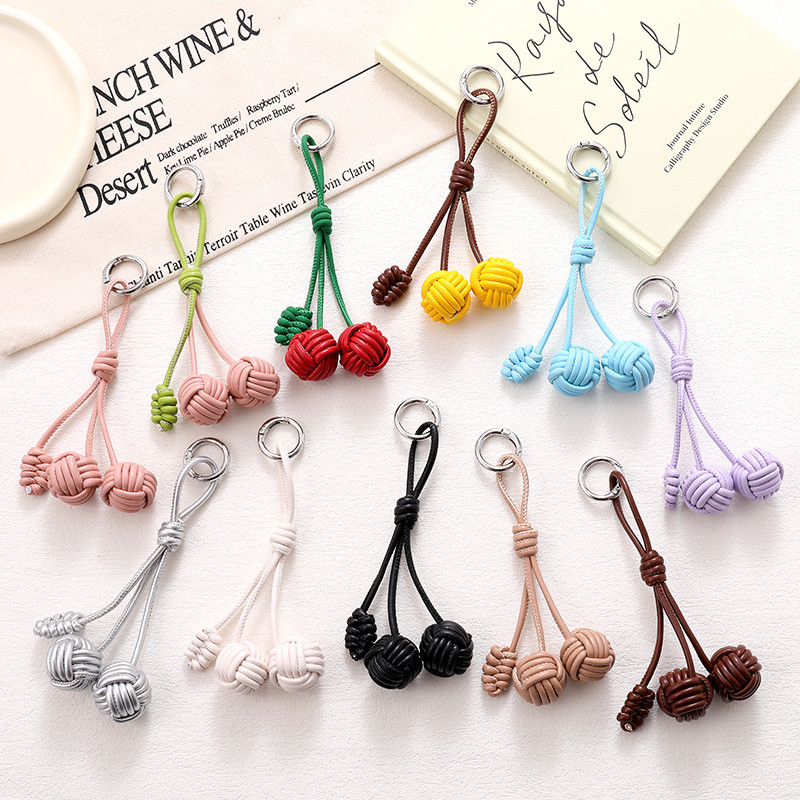 แฟชั่น All-Match Candy สี PU หนังเชือกจี้โทรศัพท์มือถือทอมือ Double Ball กระเป๋าจี้ Niche โทรศัพท์มือถือแขวน Chain