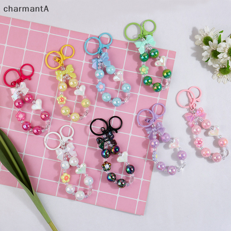 Charmanta หวานสีสันโบว์ลูกปัดพวงกุญแจจี้หูฟังโทรศัพท์อุปกรณ์ตกแต่งแฟชั่น Bowknot ลูกปัดพวงกุญแจของขวัญ VN
