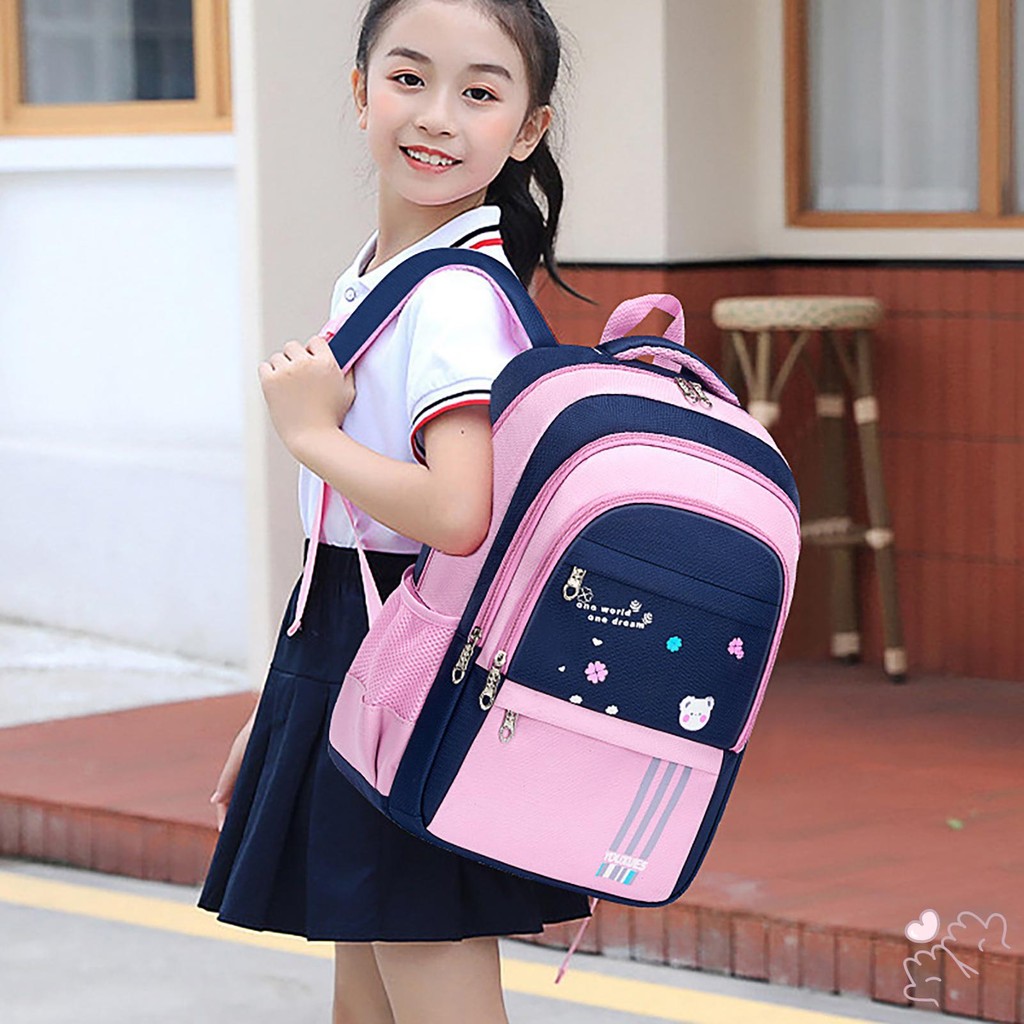 ชายหญิงแฟชั่นกระเป๋าเป้สะพายหลังรายการหนังสือขนาดใหญ่สีเขียวสีชมพูกระเป๋านักเรียนที่มีงานหนัก