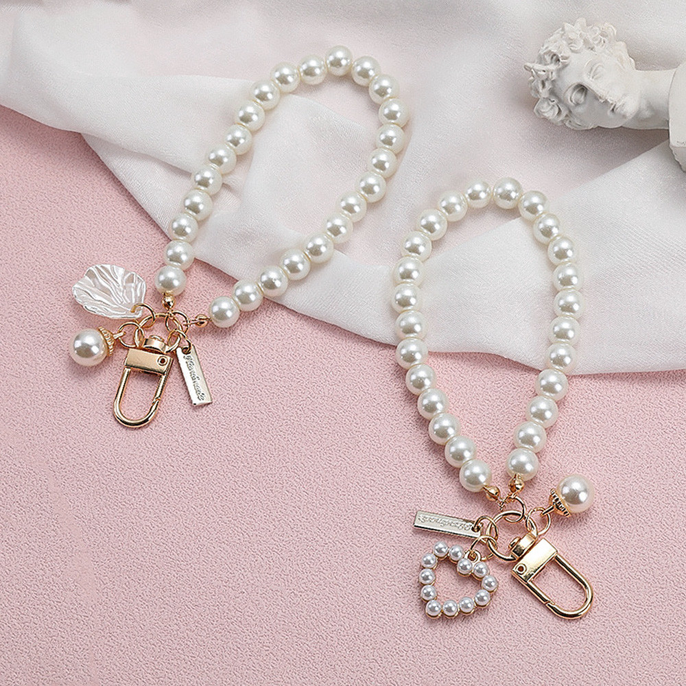 Love/shell Pretty Pearl พวงกุญแจผู้หญิงหรูหราเครื่องประดับลูกปัดมุกกระเป๋าโทรศัพท์กระเป๋าเป้สะพายหลัง Charm อุปกรณ์เสริมกุญแจรถ keyring จี้