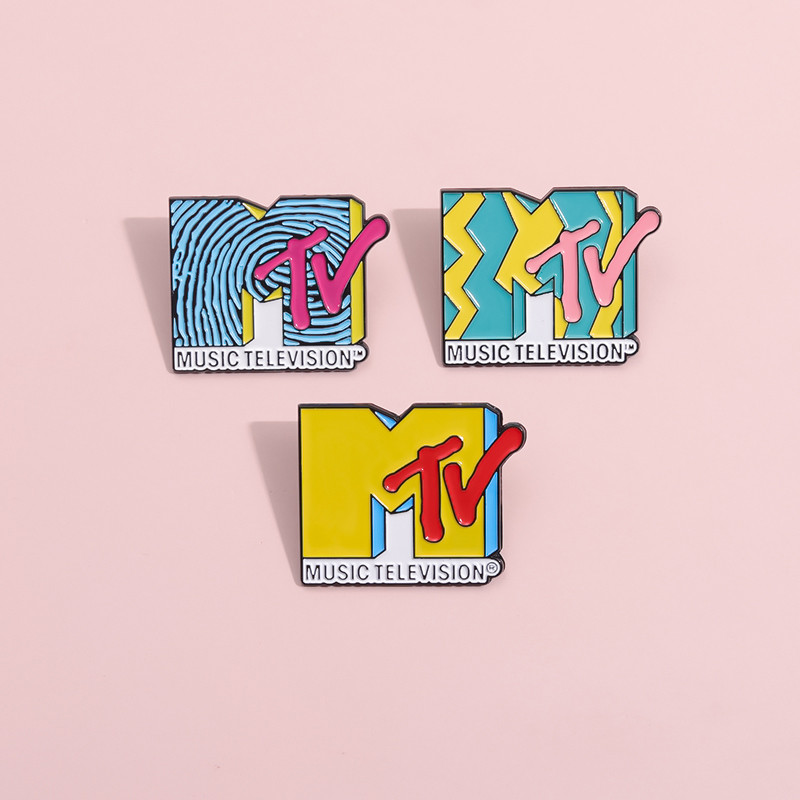 Mtv โลโก้คลาสสิกเข็มกลัด Pins Vintage เพลง Teletvision เข็มกลัดป้ายโลหะกระเป๋าเป้สะพายหลังเสื้อผ้าอุปกรณ์เสริมของขวัญ
