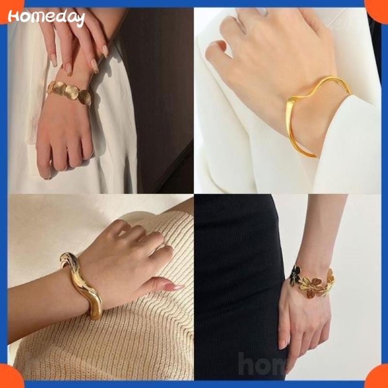 การออกแบบโลหะผิดปกติบุคลิกภาพสร้อยข้อมือโอ้อวดสําหรับผู้หญิงแฟชั่นยุโรปและอเมริกาของขวัญเครื่องประดับสูง