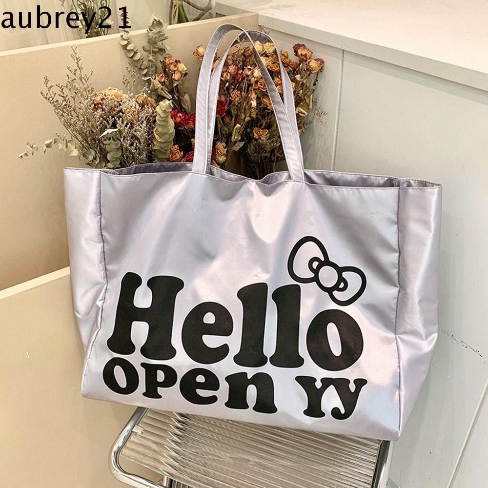 Aubrey1 กระเป๋าสะพายไนลอน, Kt Cat Letter HelloKitty กระเป๋าถือ, แฟชั่นสีทึบ Commute สไตล์เกาหลี Silver Tote Bag Travel