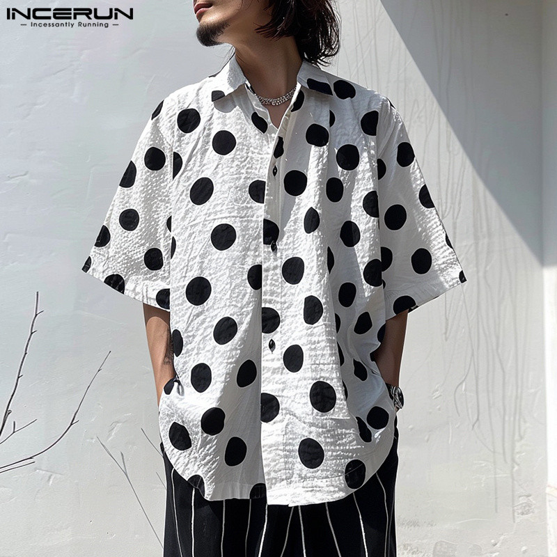 ไม่แน่นอน ผู้ชายลายจุดเนื้อย่นแขนสั้นหลวมเสื้อลําลอง