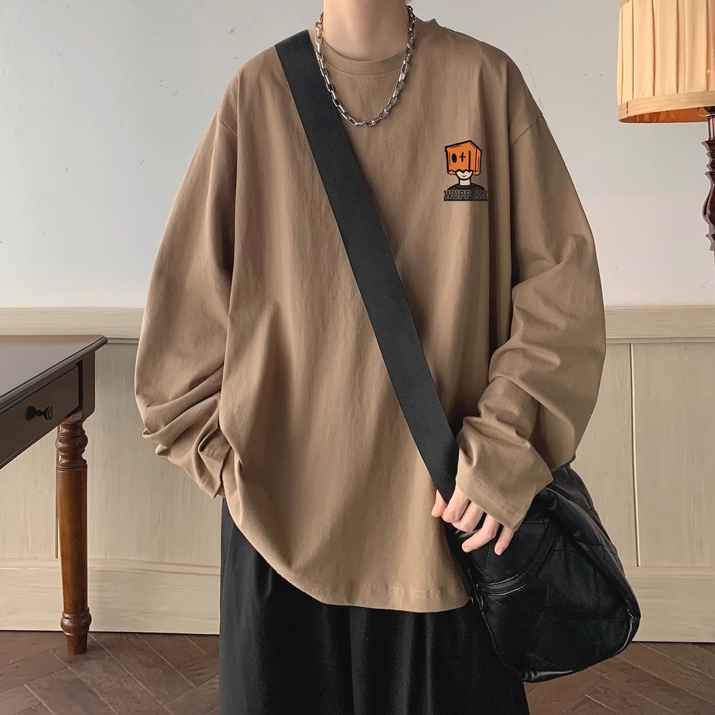 🔥D.H🔥 เสื้อยืดแขนยาวทรงหลวมไซส์ใหญ่พิมพ์ลายการ์ตูนผู้ชายเสื้อตัวในแนววินเทจสไตล์อเมริกันสำหรับฤดูใบไม้ร่วงและฤดูหนาว