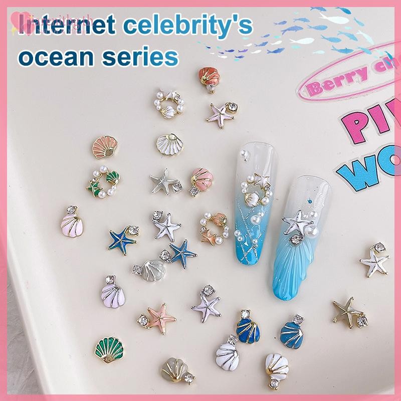 RENBG 5 ชิ้น Sea Charms ปลาดาวตกแต่งเล็บ Rhinestones Rivets หินไข่มุก Clam Mussel โลหะฤดูร้อนเล็บอะไหล่ออกแบบอุปกรณ์เสริม TH ราคา ถูกที่สุด ดีลบีเคเค แกลเลอรีภาพที่ 2