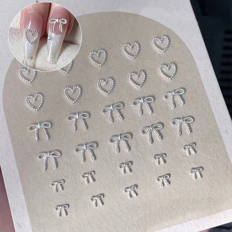 10pcs โลหะผสม Bowknot Love เล็บ Art Charms ตกแต่ง 3D โลหะหรูหรา Silver Bows รูป Jewellery DIY เล็บออกแบบอุปกรณ์