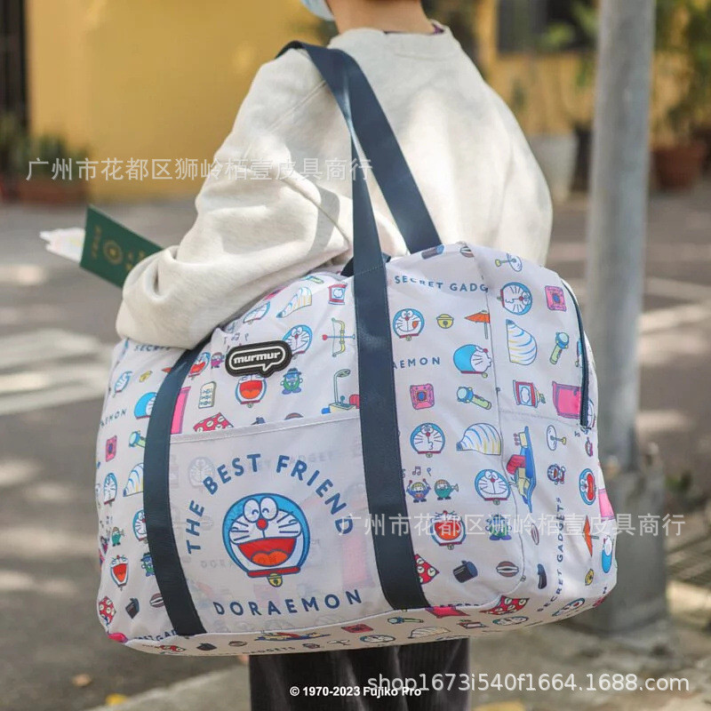 KT[ พร้อมส่งจากร้านไทย]ลิขสิทธิ์แท้ % Doreamon กระเป๋าโดเรม่อน เป็นกระเป๋าพับได้ พกพาสะดวก กระเป๋าจัดระเบียบจุมากๆค่ะ