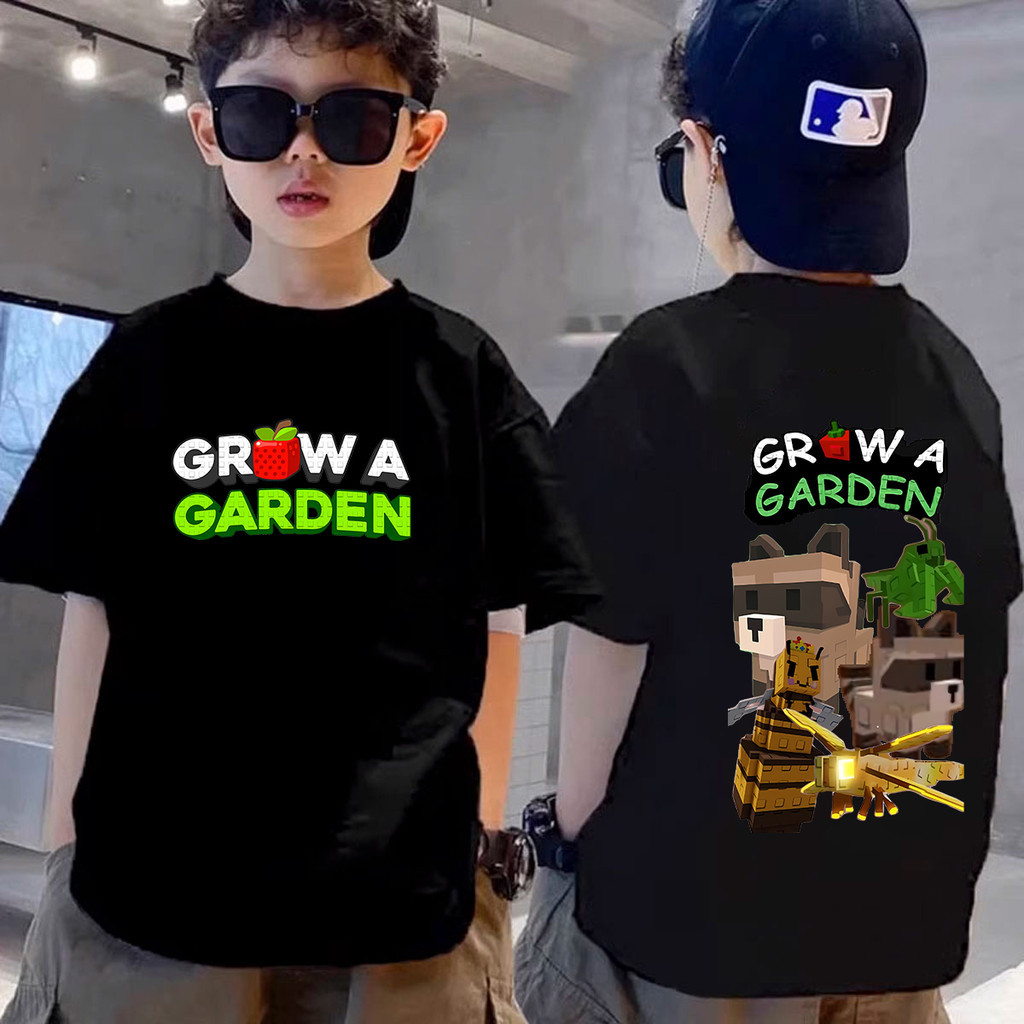 GROW A GARDEN Roblox เกมเสื้อเด็กสําหรับตู้การ์ตูน Round Yard Tee พิมพ์ 95-150 ซม.