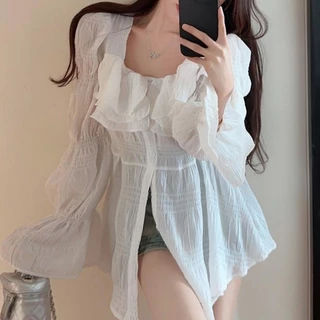 เสื้อแขนยาวแต่งอกทรงขนมชั้น น่ารักมาก สม็อกหลังยืดได้เยอะ รุ่นกระดุมแต่ง ผ้าชีฟองบาง ทรงสวยเข้ารูป แฟชั่นเกาหลี