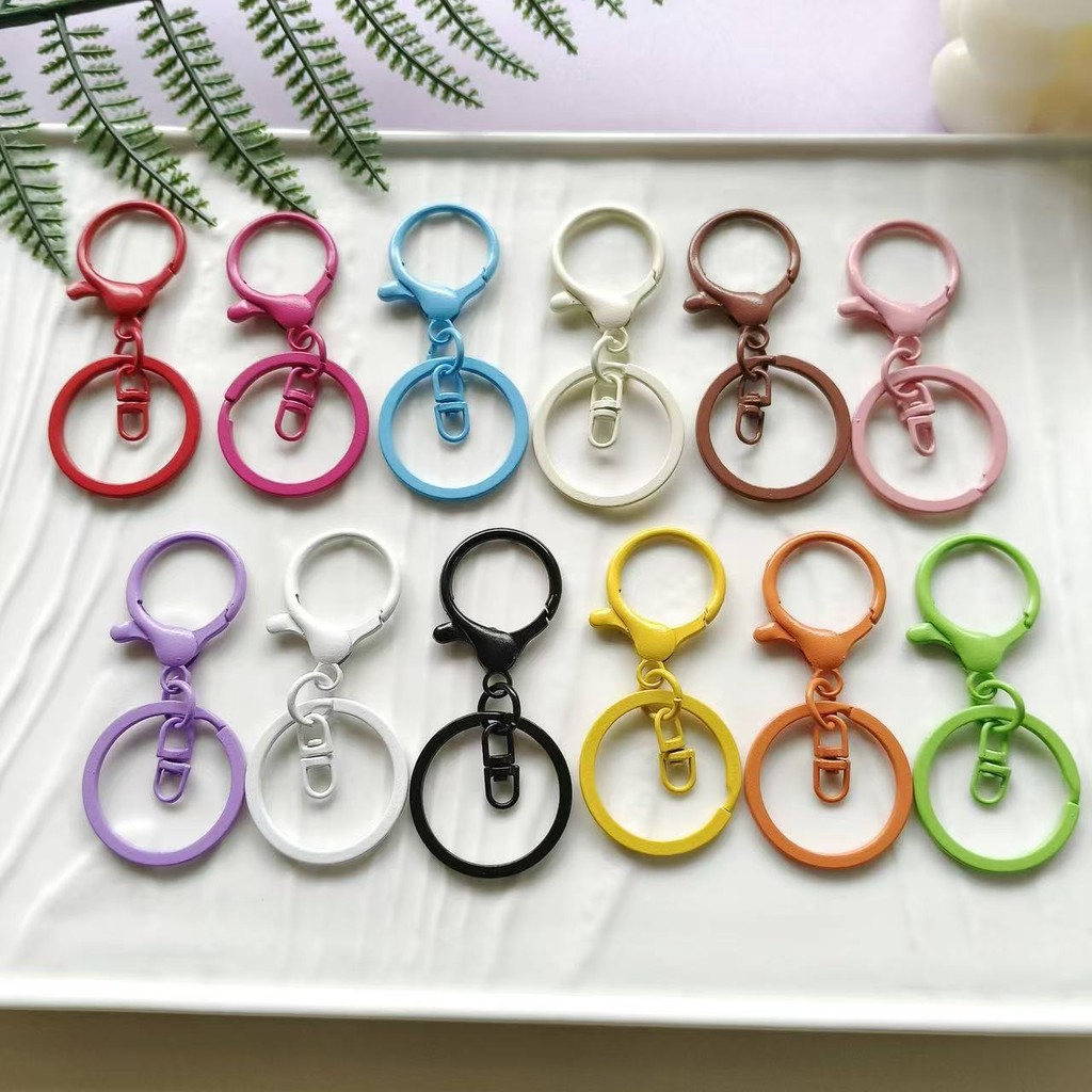 5ชิ้น/ล็อตสีอบที่มีสีสันแปดตัวอักษรสามชิ้นชุดปุ่มกุ้งก้ามกรามวงกลมพวงกุญแจจี้หัวเข็มขัดฤดูใบไม้ผลิทําเองอุปกรณ์เสริมพวงกุญแจ