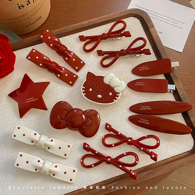 คริสต์มาสใหม่การ์ตูนKTกิ๊บติดผมแมวสไตล์ปีใหม่สีแดงโบว์เรียบคลิปแฟชั่นสาวอุปกรณ์ผม