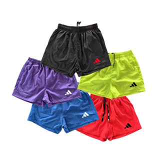 กางเกงขาสั้นแบรนด์กีฬาวิ่งสีทึบระบายอากาศสําหรับผู้ชาย