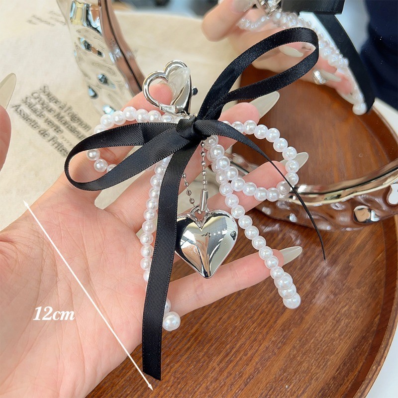 พวงกุญแจริบบิ้นโบว์มุกประณีต-จี้กระเป๋าโบว์ลูกปัดหวาน-ตกแต่งสาวที่สง่างามสําหรับกระเป๋าและโทรศัพท์ - รูปที่ 5