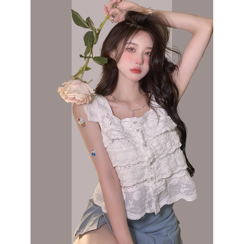 เสื้อเชิ้ตกระดุมแถวเดียวคอเหลี่ยมโชว์ไหปลาร้าสไตล์เกาหลีรุ่นใหม่เสื้อแขนกุดลูกไม้ฉลุลายกวนหม่าจิเจีย Unen