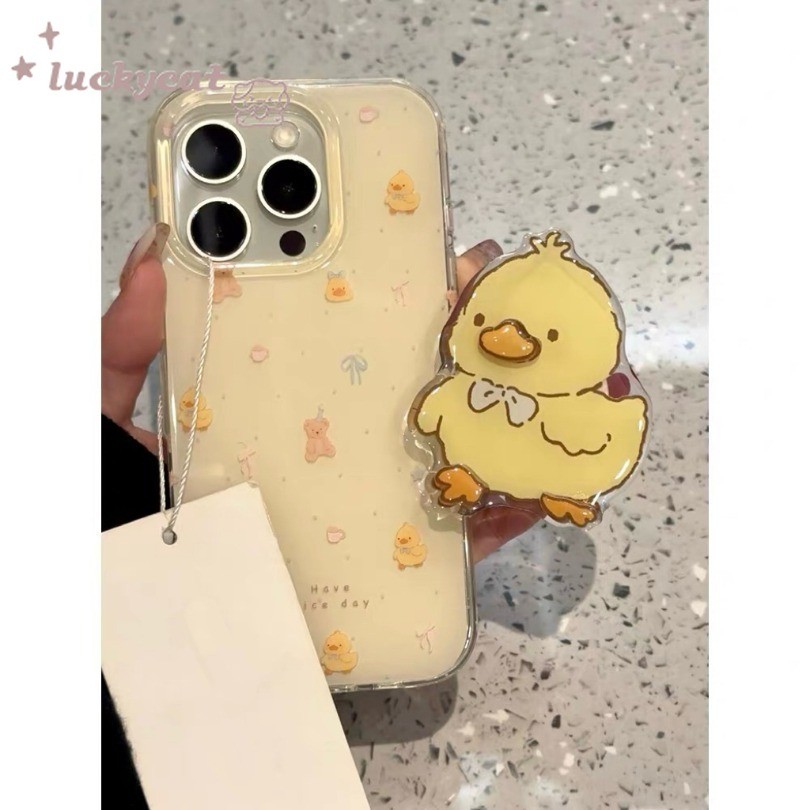 ใช้งานร่วมกับ iPhone 16 15 14 13 12 11 Pro Max X Xr Xs Max 7 8 Plus SE2020 เคสโทรศัพท์ Ins น่ารักสีฟ้าโบว์เป็ดสีเหลือง + ขาตั้งนุ่มปกหลัง