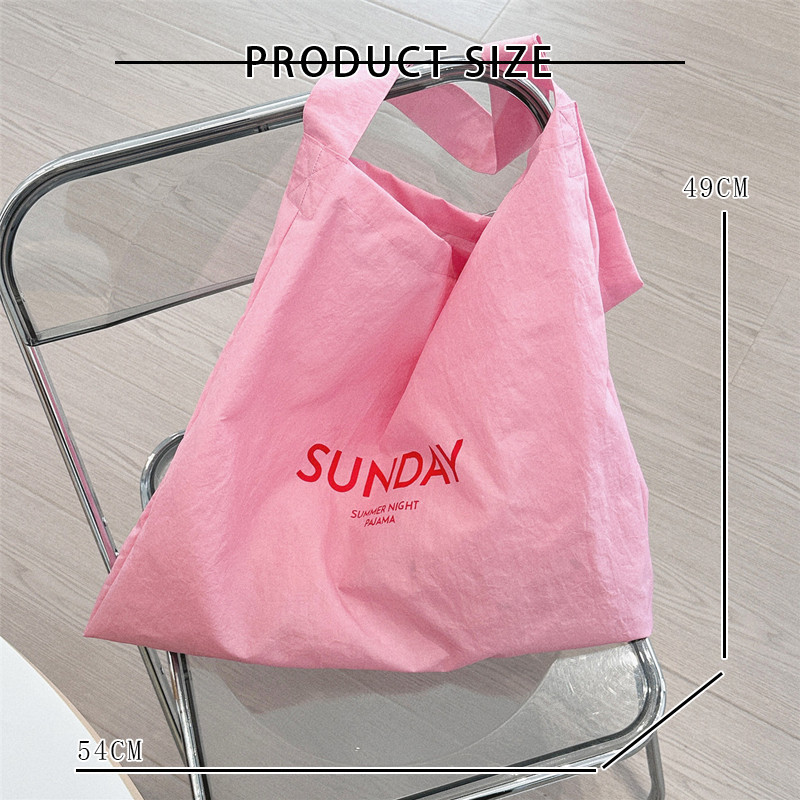 ยาดู เวอร์ชั่นเกาหลีของการออกแบบพิมพ์ตัวอักษรเฉพาะผ้าใบกระเป๋าความจุขนาดใหญ่พร็อพกระเป๋าสะพายสีลูกกวาด
