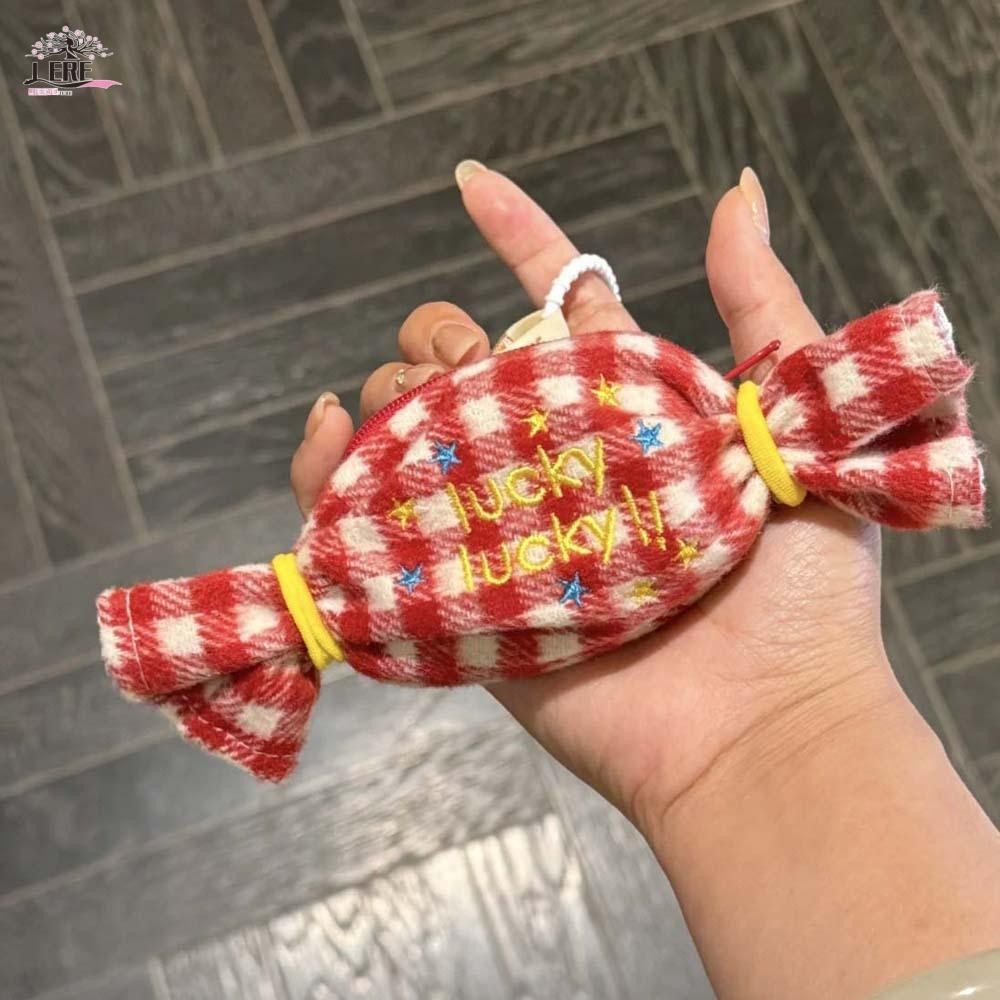 กระเป๋าใส่ของเล็กๆ ออกแบบน่ารัก หวานเหมือนน้ำตาล ขนาดพกพาสะดวก มีระบบป้องกันสูญหาย ใส่ลิปสติกและหูฟังได้