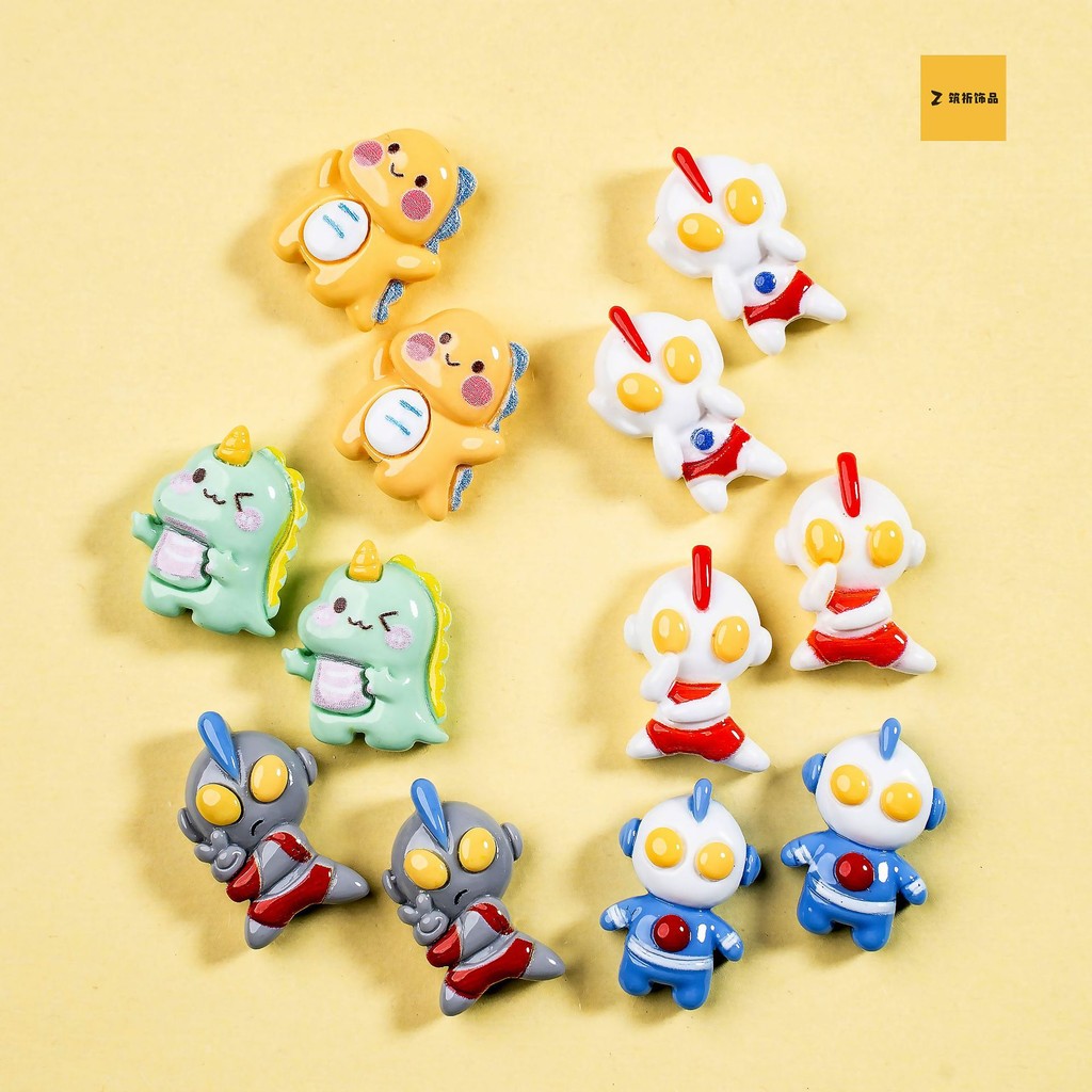 ใหม่เงางามมอนสเตอร์อุลตร้าแมน DIY เชือกมัดผมกิ๊บติดผมสติกเกอร์เครื่องเขียนเด็กเคสมือถือชุดอุปกรณ์เรซินแฮนด์เมด