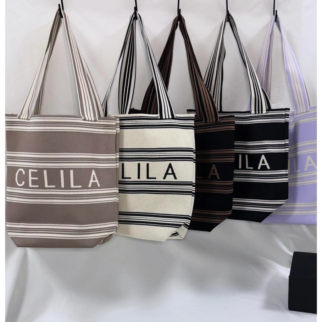 【พร้อมส่ง】miss bag fashion กระเป๋าช๊อปปิ้งไฮโซทอลายริ้ว กระเป๋าทรงสวย