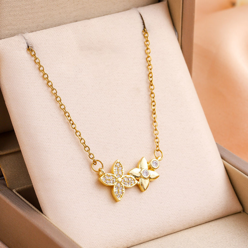 ดอกไม้สไตล์ใหม่ Gold-Plated Diamond-Studded สร้อยคอเหล็กไทเทเนียมหญิง Niche หรูหราประณีตแฟชั่นทั้งหมด @