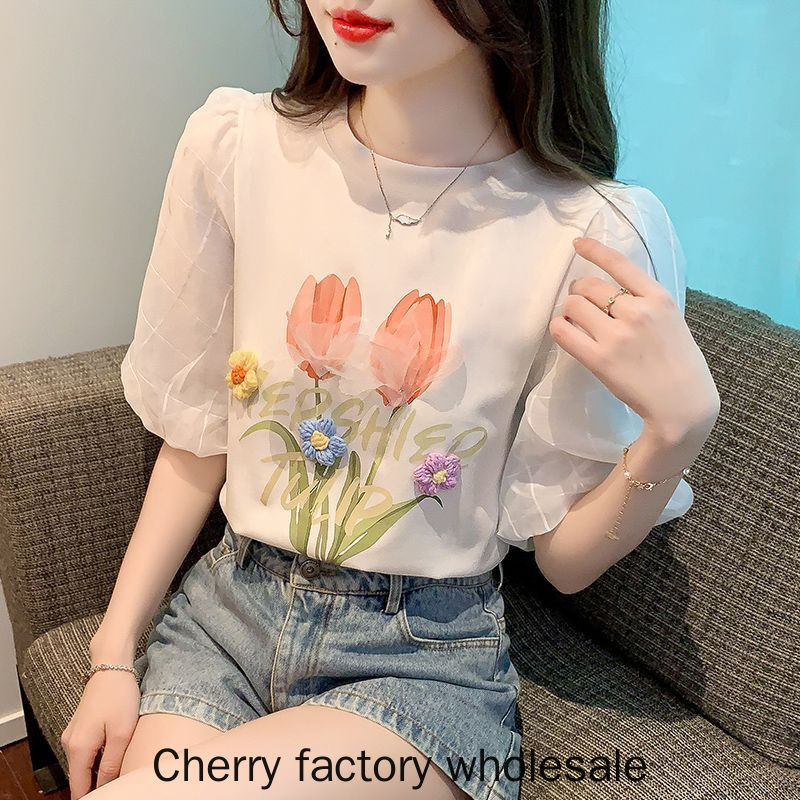 แฟชั่นผู้หญิงสไตล์ใหม่สีขาวพัฟแขนผ้าฝ้ายแท้แขนสั้นเสื้อยืดสามมิติดอกไม้อายุ @