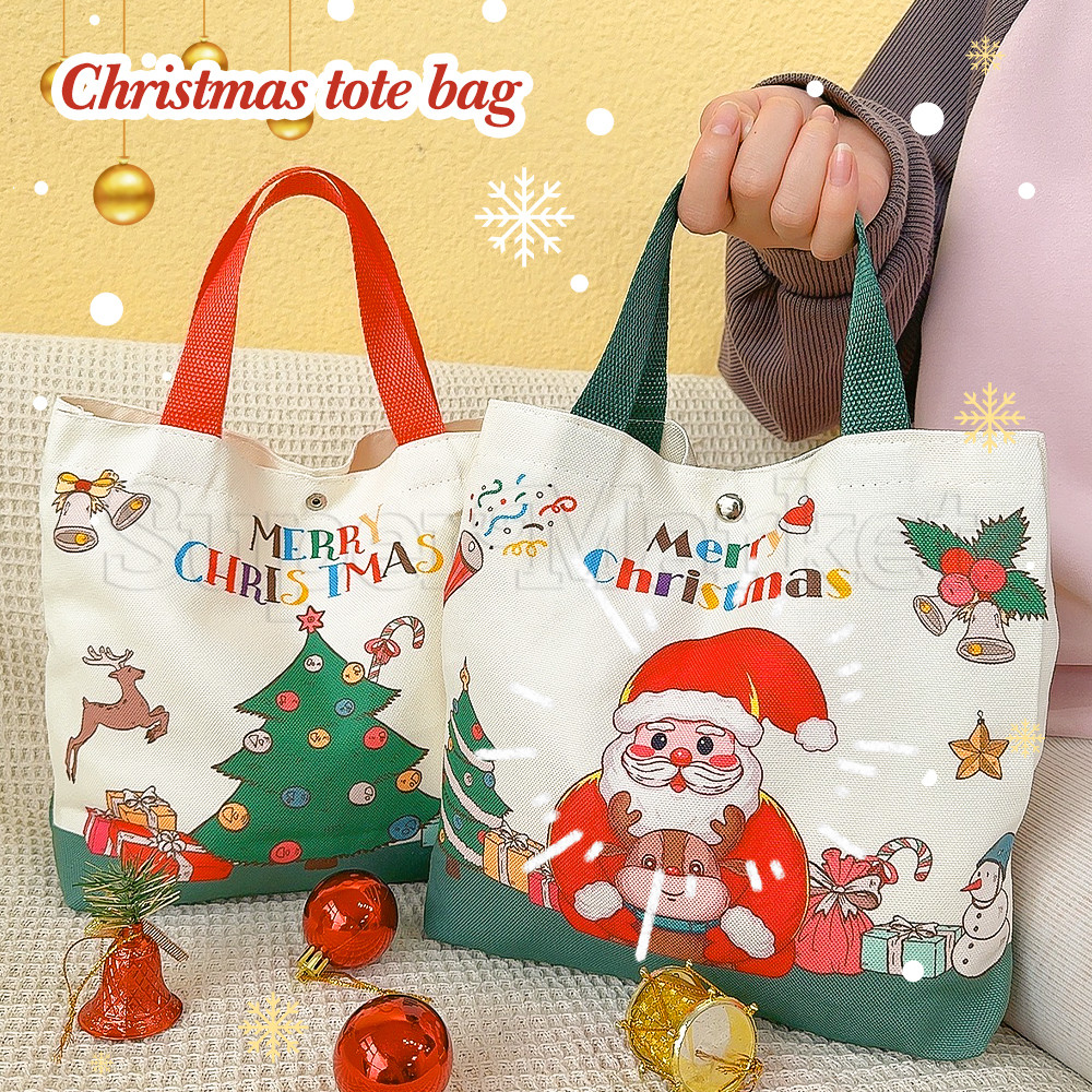 [ ที่โดดเด่น ] Christmas Canvas Pocket - กระเป๋าโท้ตลายซานตาคลอส - กระเป๋าช้อปปิ้งความจุขนาดใหญ่ - กระเป๋าคอมมูติ้งนักเรียน - ที่จัดระเบียบแฟชั่น - ตกแต่งปาร์ตี้คริสต์มาส