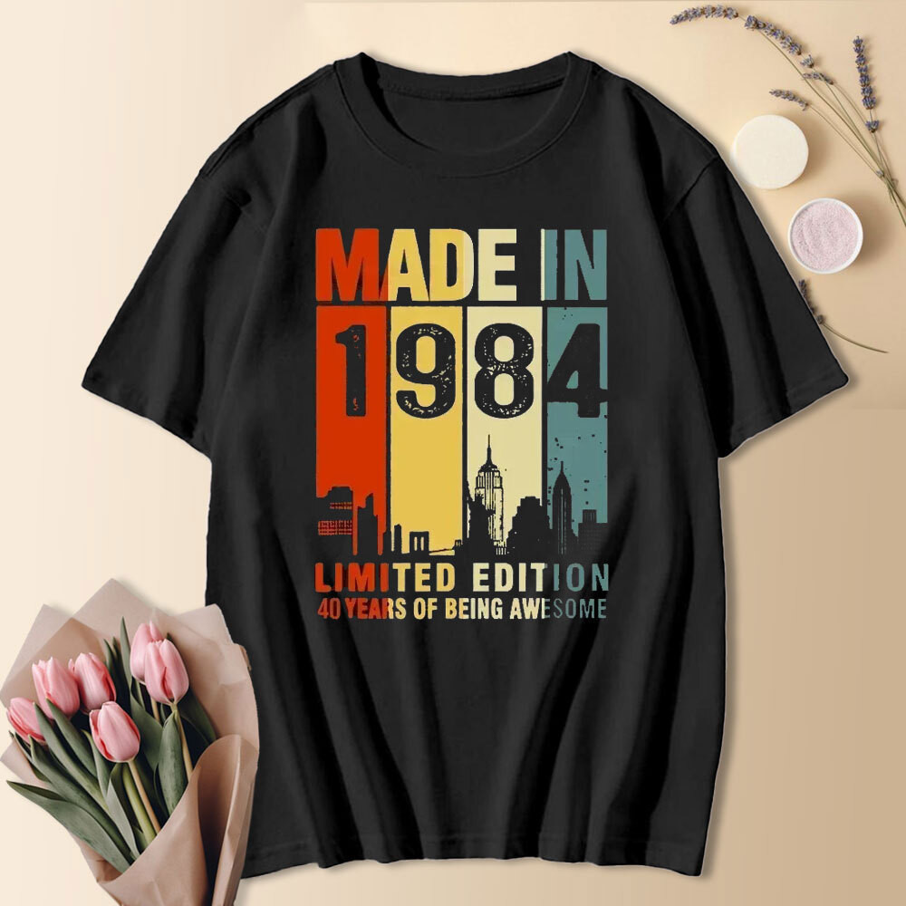 เสื้อยืดคอกลมแขนสั้นผ้าฝ้ายวินเทจปี 1984 สำหรับผู้ชายและผู้หญิง ของขวัญวันเกิดครบรอบ
