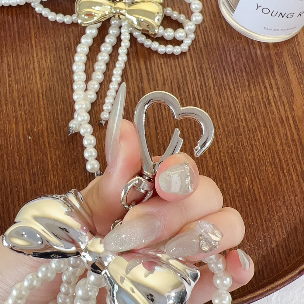 Fashionabl Bow Pearl Bag Charm- พวงกุญแจริบบิ้นโบว์หวาน-จี้โบว์โลหะอเนกประสงค์ที่หรูหรา