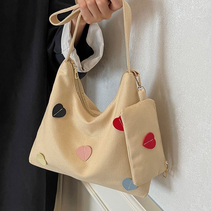 นักเรียนวิทยาลัย Class กระเป๋าผ้าใบหญิง Niche Love Tote Messenger กระเป๋าขนาดใหญ่ความจุ Commuter Shoul