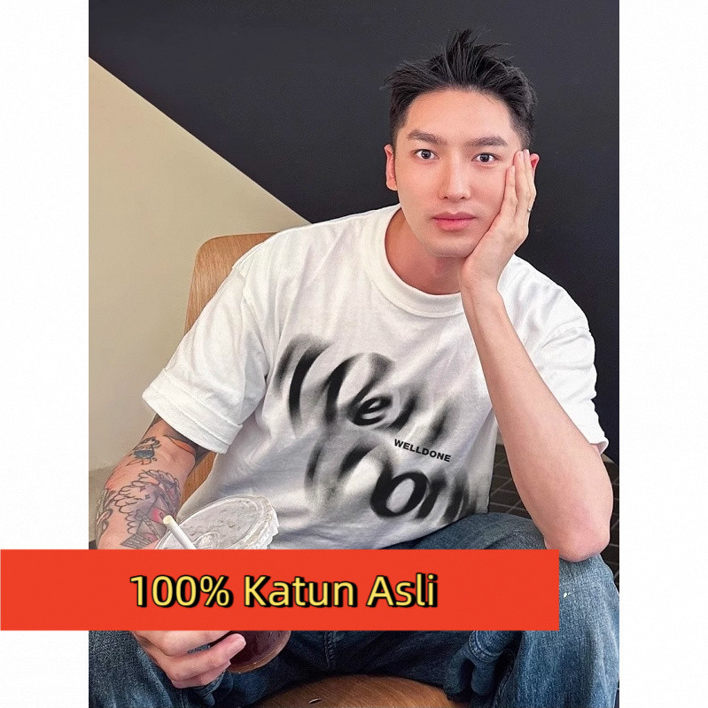 เสื้อยืดสีดํา WE11DONE Signature