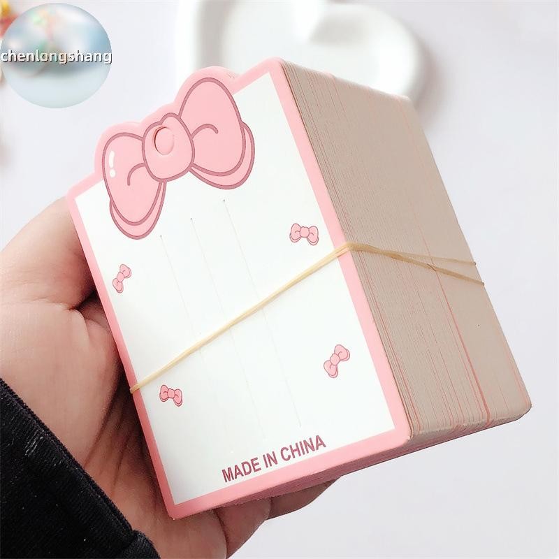 โบว์สีชมพูกับคลิปกระดาษ 50 ชิ้น พร้อมของประดับผมและห้อยแท็ก DIY