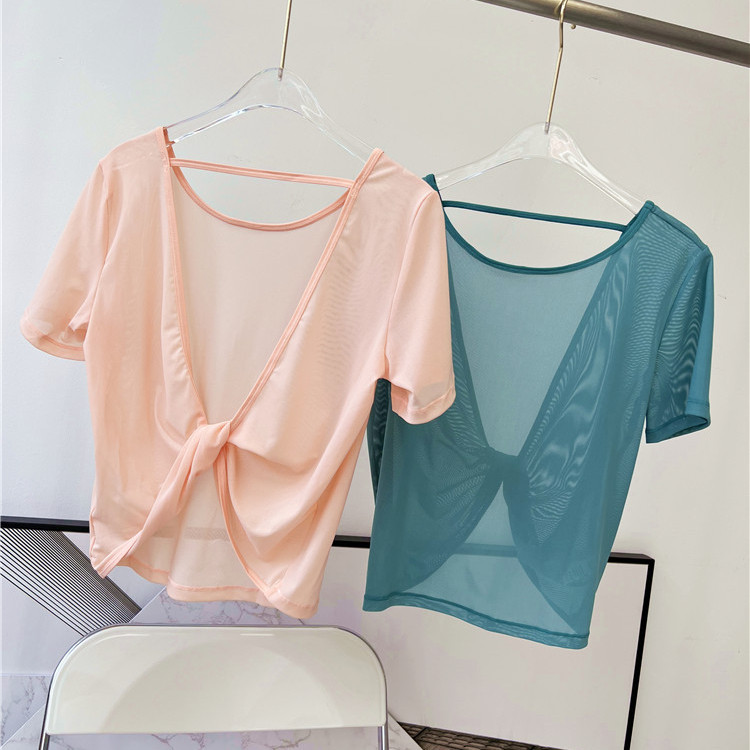 【MAGGIEYOGA】เสื้อกีฬาดีไซน์กลวง แขนสั้นกีฬาหลวม ระบายอากาศได้ดีและแห้งเร็ว แขนสั้นวิ่งออกกำลังกายโยคะ