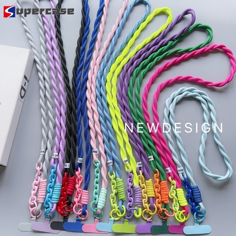 ฤดูร้อนใหม่ที่มีสีสันถักเปียโทรศัพท์เชือกเส้นเล็กยาวสีคมชัดกลางแจ้งแบบพกพา กระเป๋าสะพายข้าง เชือกเส้นเล็กป้องกันการตก โดปามีน โทรศัพท์มือถือกรณีเชือกเส้นเล็กยา