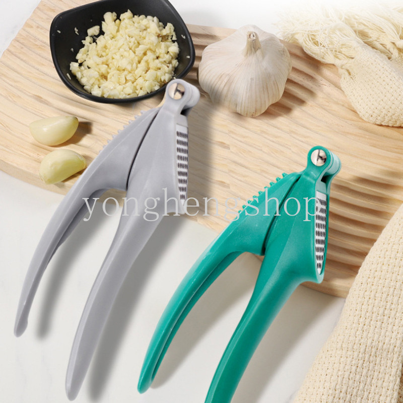 สแตนเลสกระเทียมกด Crusher มัลติฟังก์ชั่นมือถือขิงกระเทียม Mincer ผัก Squeezer Masher ครัวทําอาหารเครื่องมือ