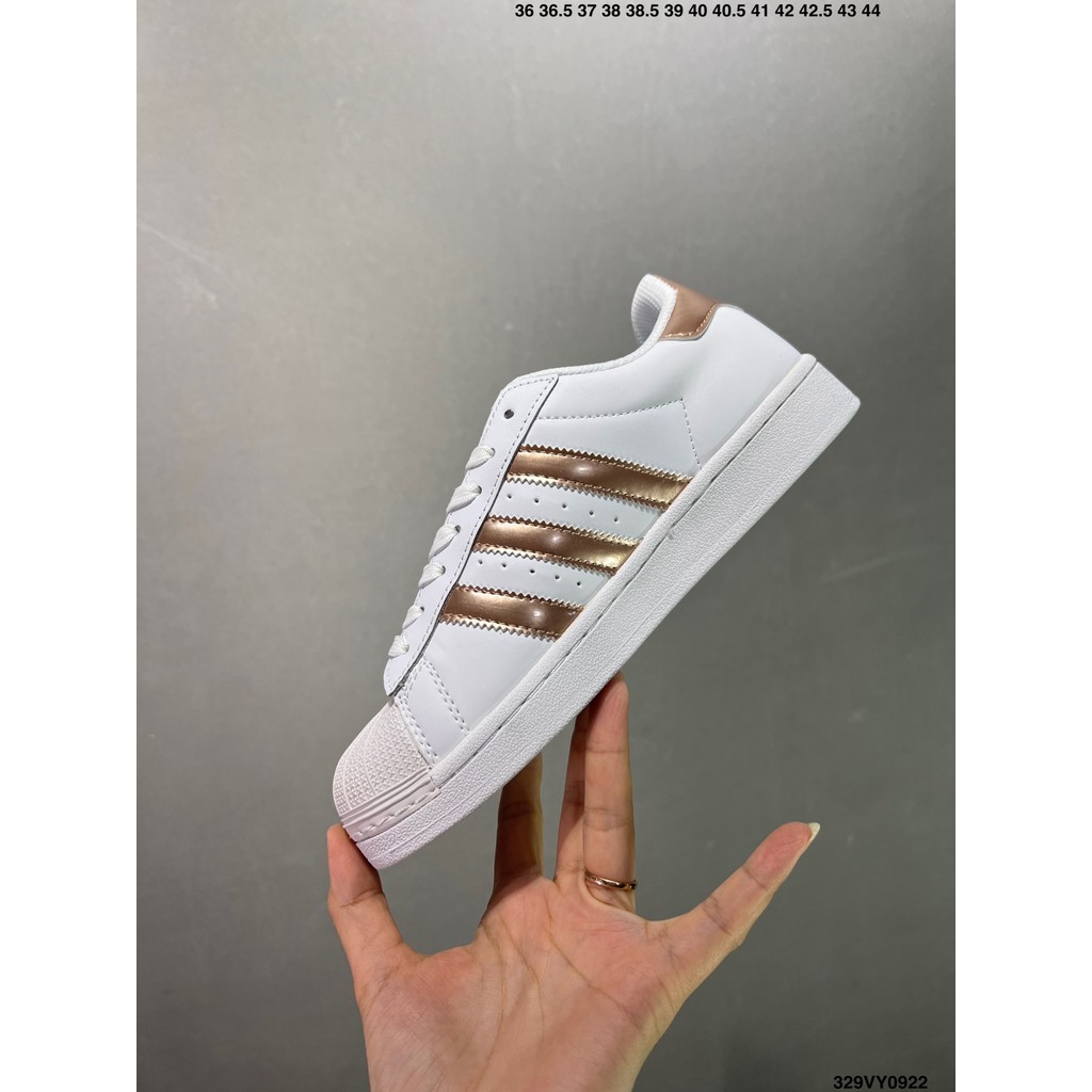 ที่มีคุณภาพสูง AD SUPERSTAR เชลล์หัวชุดสีขาวทองรองเท้าลำลองรองเท้ากีฬาน้ำหนักเบาใช้ได้ทั้งในร่มและกลางแจ้ง