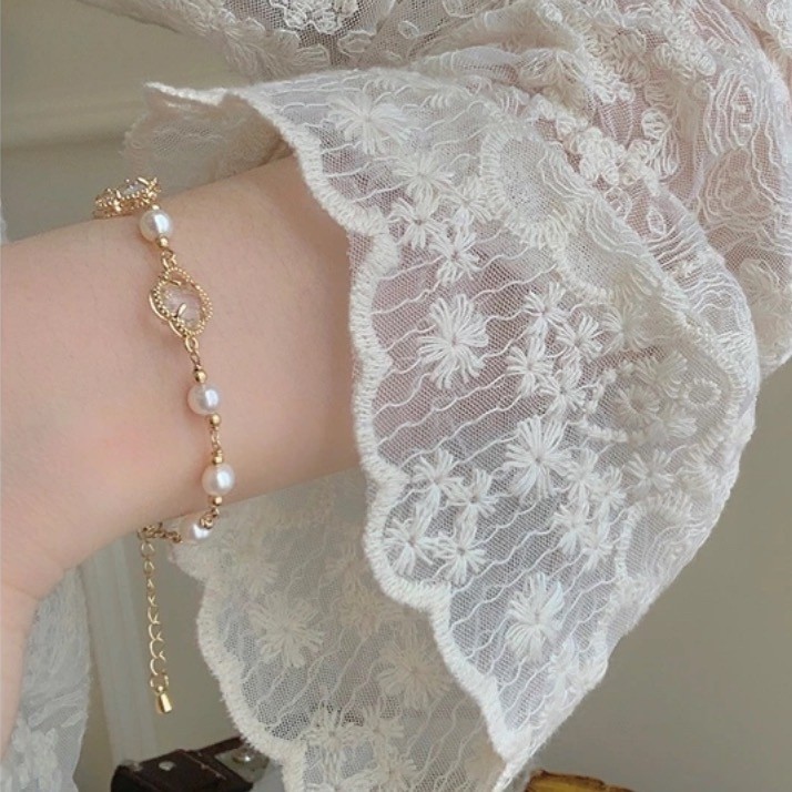 สร้อยข้อมือมุกสาวแสงหรูหราซอกการออกแบบระดับไฮเอนด์ความรู้สึกแฟนนักเรียนสร้อยข้อมือย้อนยุคลูกปัดสไตล์จีน