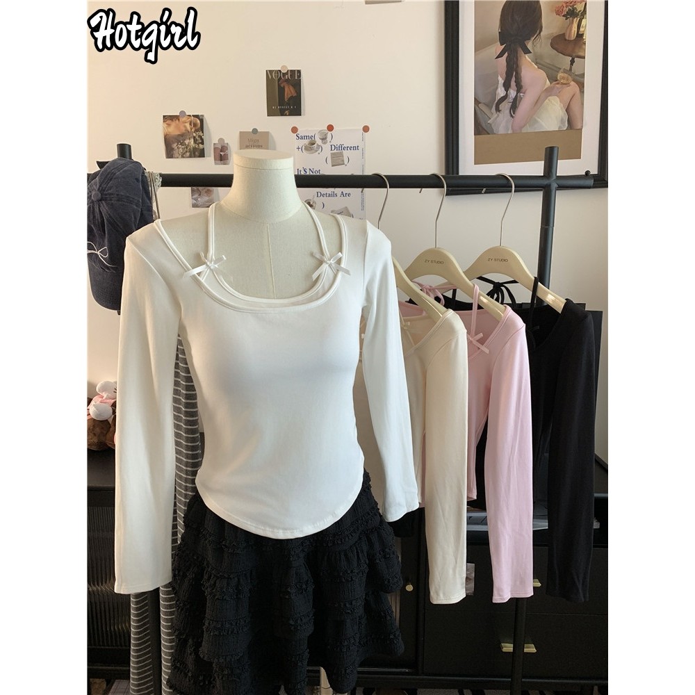 Hotgirl พร้อมส่ง เสื้อยืดแขนยาวผู้หญิง เสื้อรัดรูป ดีไซน์เก๋ไก้และเซ็กซี่ แต่งโบว์ คอแขวน สไตล์เกาหลี