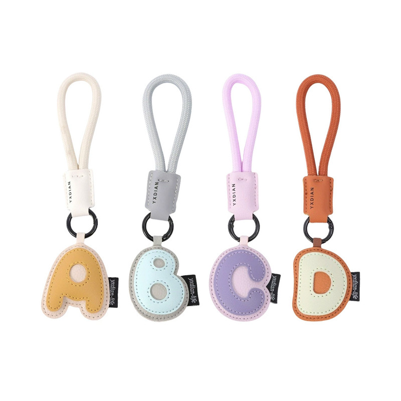 พวงกุญแจ PU หนังสีสันสดใส พร้อมสายรัดข้อมือ anti-loss ใช้งานได้หลากหลาย เช่น กับกระเป๋าเดินทาง กล้อง และโทรศัพท์