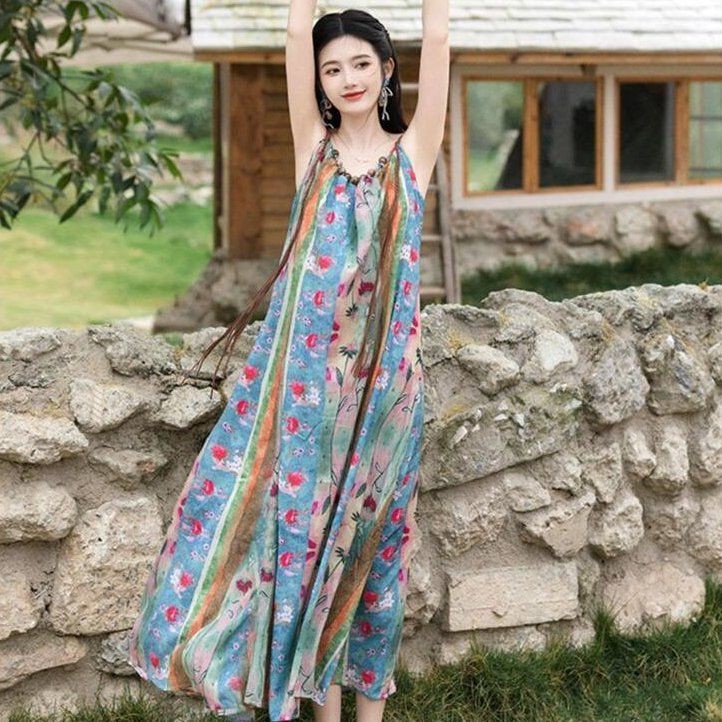 สไตล์ชาติพันธุ์ยูนนานท่องเที่ยวสวมใส่ผู้หญิงโบฮีเมียนชุดมัดย้อมดอกไม้กระโปรงยาวผู้หญิงคาร์ดิแกนชุดฤดูร้อน หรือ240821