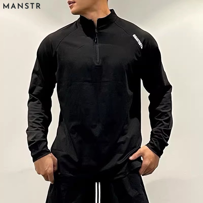 MANSTR สไตล์อเมริกันผู้ชายครึ่งซิปแขนยาวเสื้อยืดแห้งเร็วกีฬาด้านบนขี่จักรยานวิ่งออกกําลังกายการฝึกอบรมแฟชั่นที