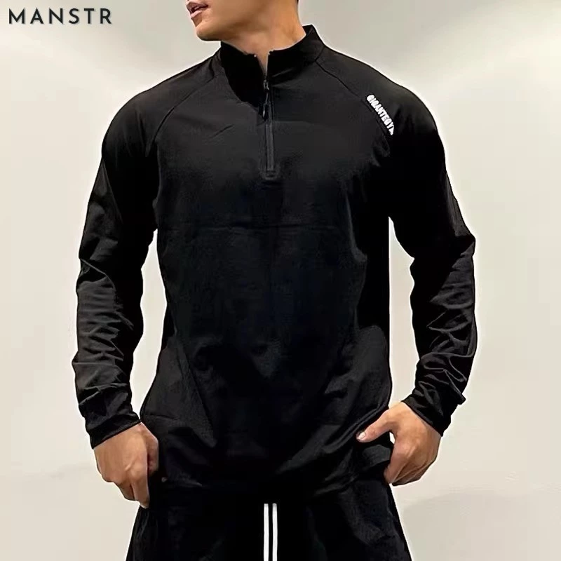 MANSTR สไตล์อเมริกันผู้ชายครึ่งซิปแขนยาวเสื้อยืดแห้งเร็วกีฬาด้านบนขี่จักรยานวิ่งออกกําลังกายการฝึกอบรมแฟชั่นที