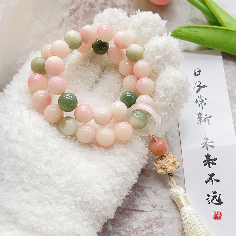 12มิลลิเมตรไล่โทนสีสีโพธิ์รากมือถือลูกปัดโลตัสสร้อยข้อมือหญิงอุปกรณ์เสริมมือถือจี้