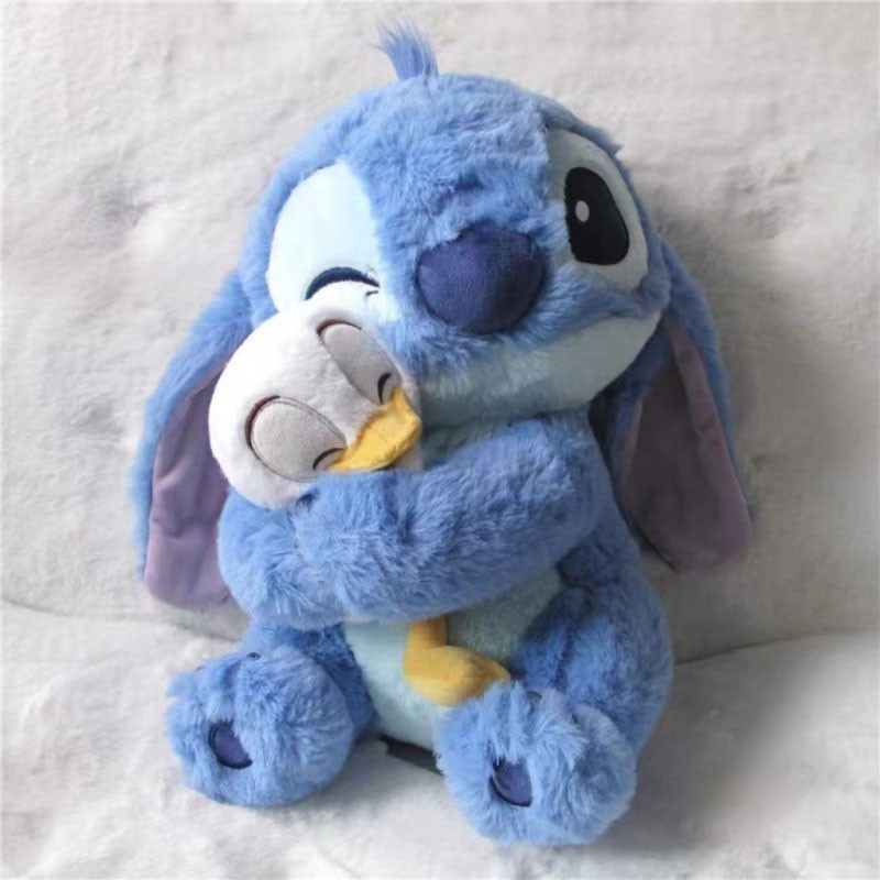 กอดเป็ดเป็ดตะเข็บการ์ตูนstitchตุ๊กตาcreative Little Duck Stitchตุ๊กตาDisney Plushของเล่นเด็กวันเกิดของเล่น